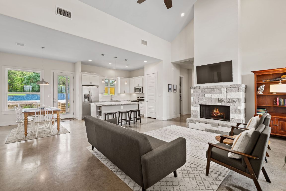 Dining room, Fireplace, Interior, Kitchen, Living room, Pendant Lights, Recessed Lighting, Stainless Steel Appliances