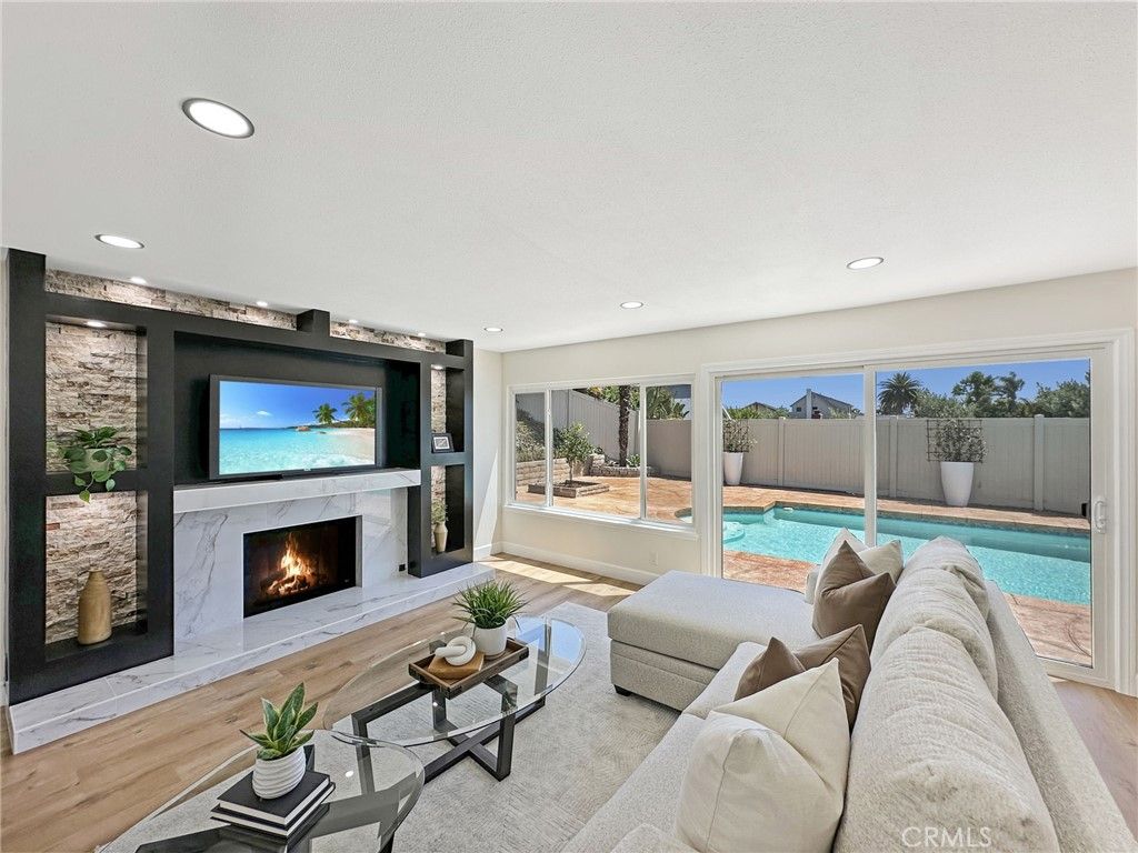 Fireplace, Interior, Living room, Pool, Recessed Lighting, Wood Texture Flooring