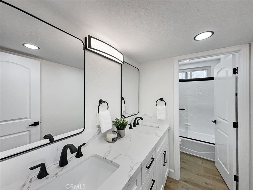 Bathroom, Dual Sink Vanities, Interior, Recessed Lighting, Wood Texture Flooring