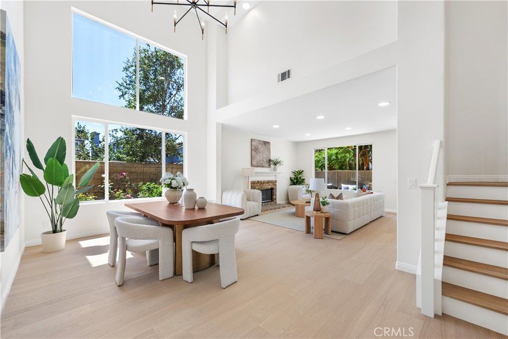 Dining room, Fireplace, Interior, Living room, Pendant Lights, Recessed Lighting, Wood Texture Flooring