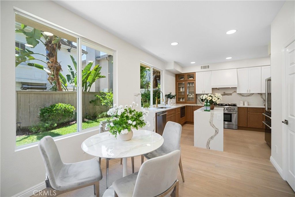 Dining room, Interior, Kitchen, Recessed Lighting, Stainless Steel Appliances, Wood Texture Flooring