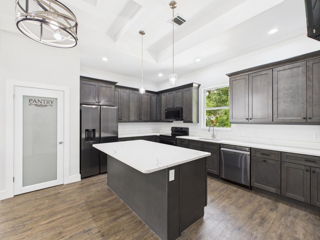 Interior, Kitchen, Pendant Lights, Recessed Lighting, Stainless Steel Appliances, Wood Texture Flooring