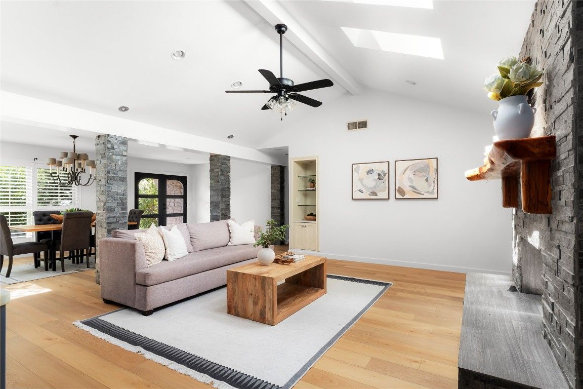 Chandelier, Dining room, Interior, Living room, Recessed Lighting, Stone Walls, Wood Texture Flooring