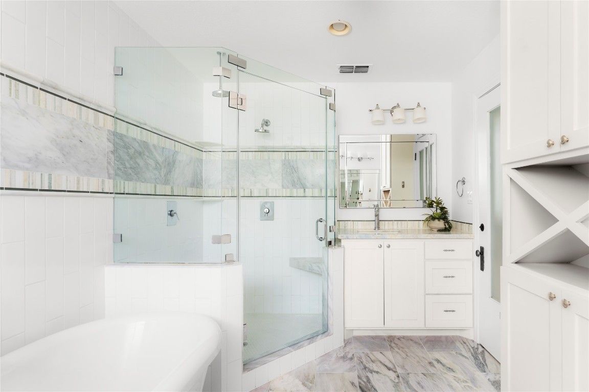 Bathroom, Dual Sink Vanities, Glass Shower, Interior, Marble, Recessed Lighting