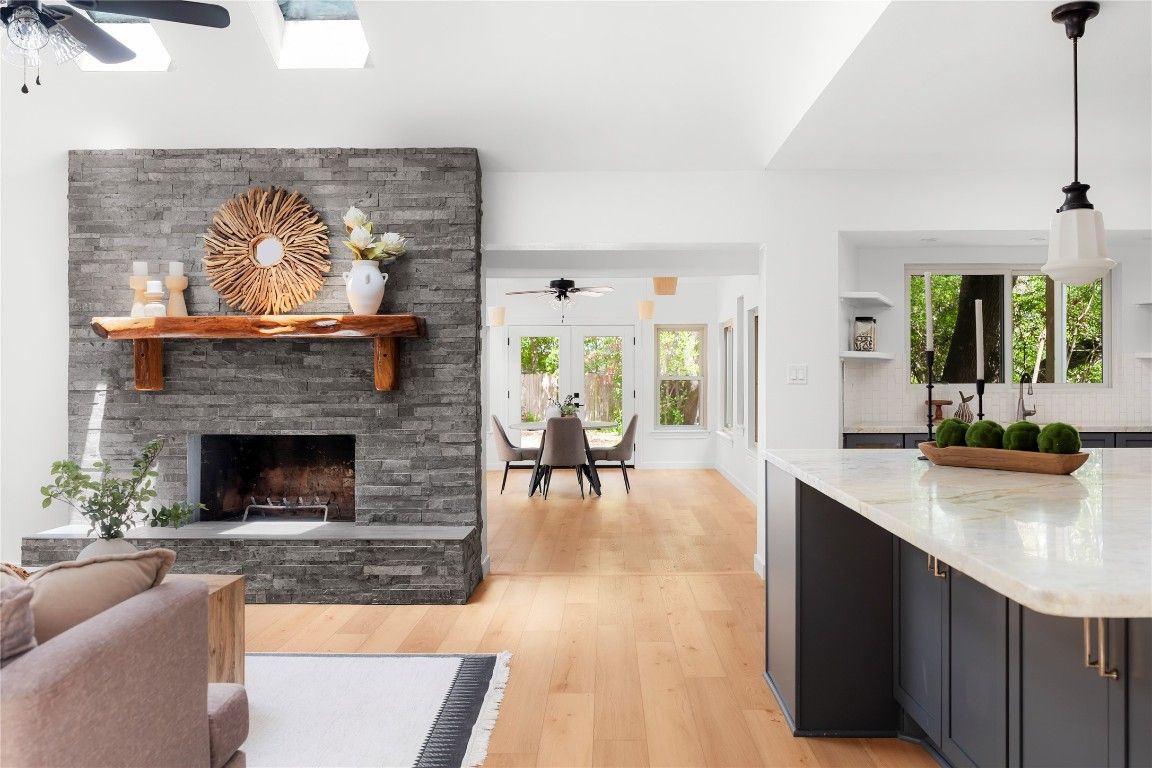 Dining room, Fireplace, Interior, Pendant Lights, Stone Walls, Wood Texture Flooring
