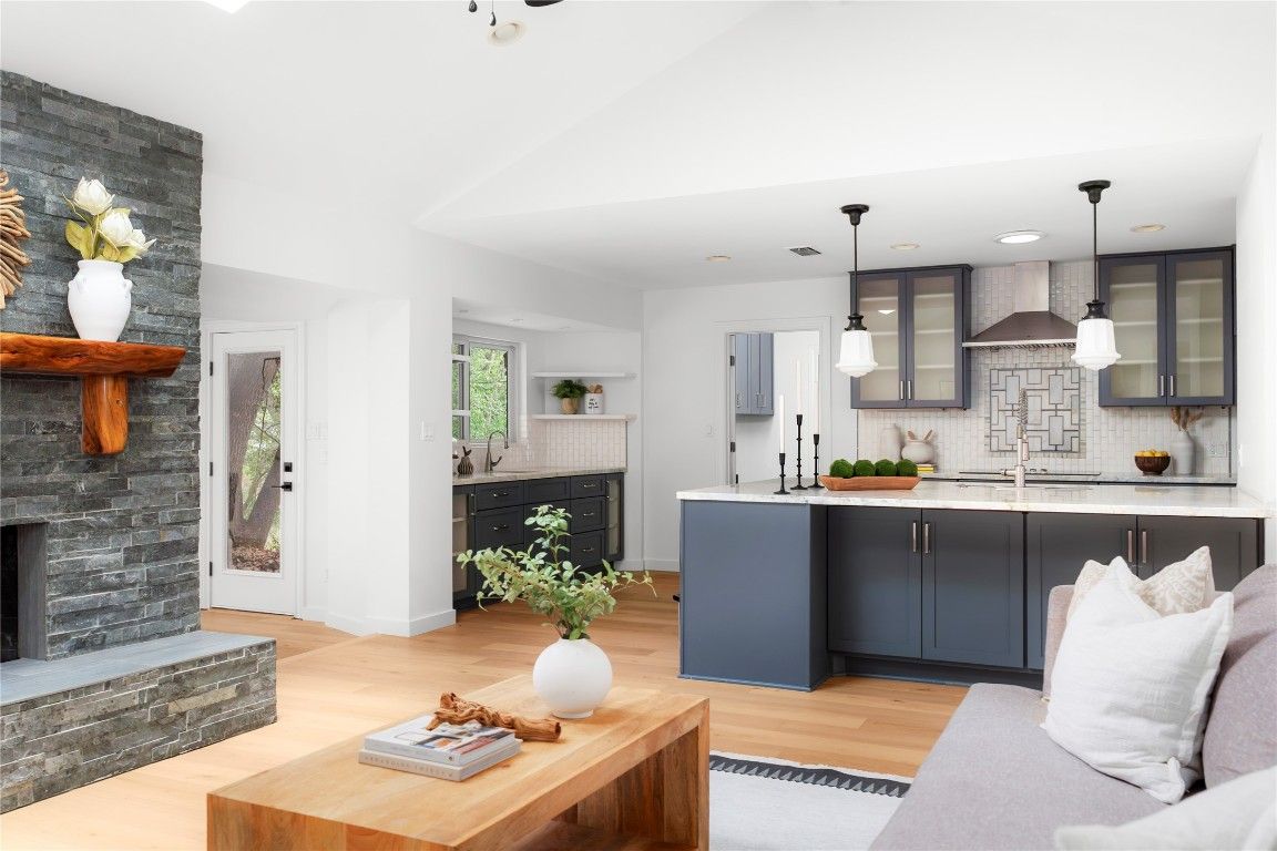 Fireplace, Interior, Kitchen, Pendant Lights, Recessed Lighting, Stone Walls, Wood Texture Flooring
