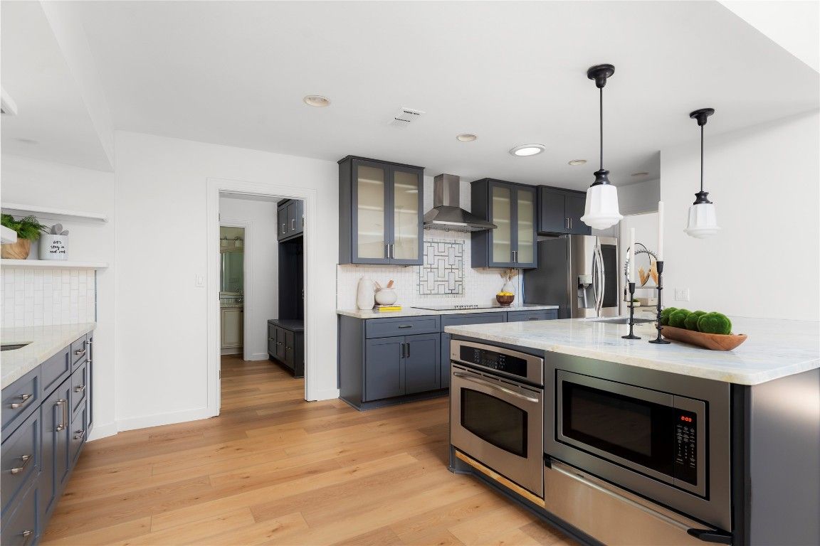 Interior, Kitchen, Pendant Lights, Recessed Lighting, Stainless Steel Appliances, Wood Texture Flooring