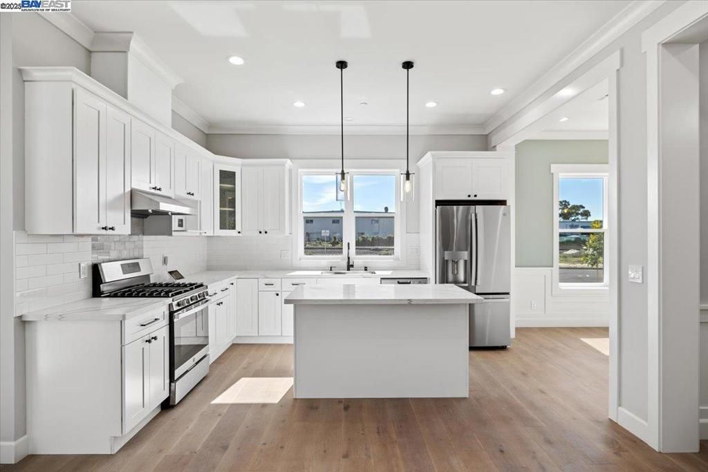 Interior, Kitchen, Pendant Lights, Recessed Lighting, Stainless Steel Appliances, Wood Texture Flooring