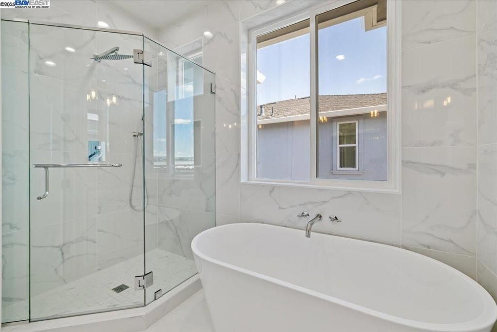 Bathroom, Free Standing Baths, Glass Shower, Interior, Marble Walls, Recessed Lighting