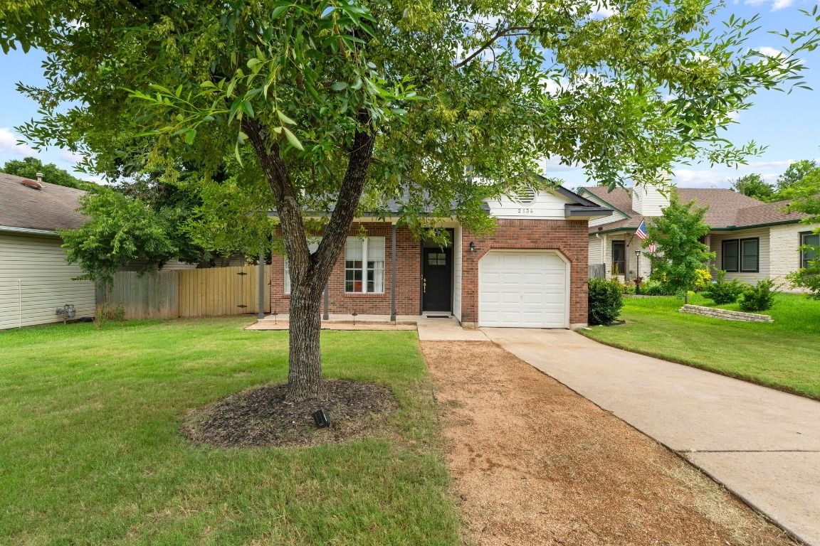 Attached, Backyard, Exterior, Facade, Brick Facade, Ranch