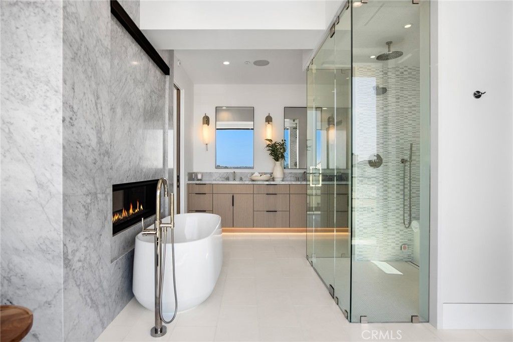 Bathroom, Fireplace, Free Standing Baths, Glass Shower, Interior, Marble Walls, Recessed Lighting