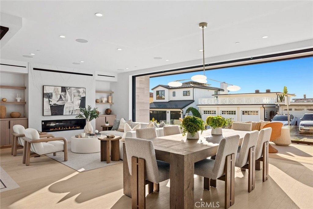 Dining room, Fireplace, Interior, Living room, Pendant Lights, Recessed Lighting, Wood Texture Flooring