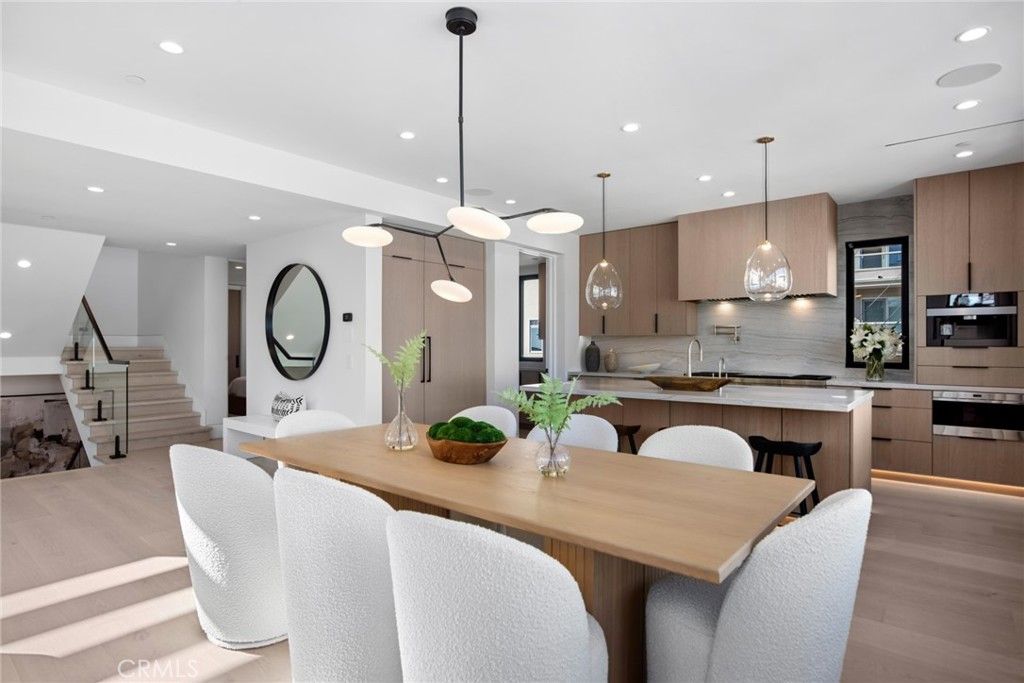 Dining room, Interior, Kitchen, Pendant Lights, Recessed Lighting, Stainless Steel Appliances, Wood Texture Flooring