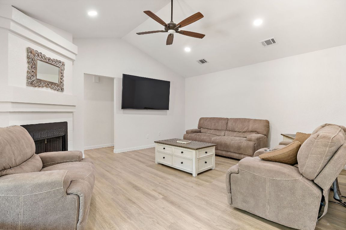 Fireplace, Interior, Living room, Recessed Lighting, Wood Texture Flooring