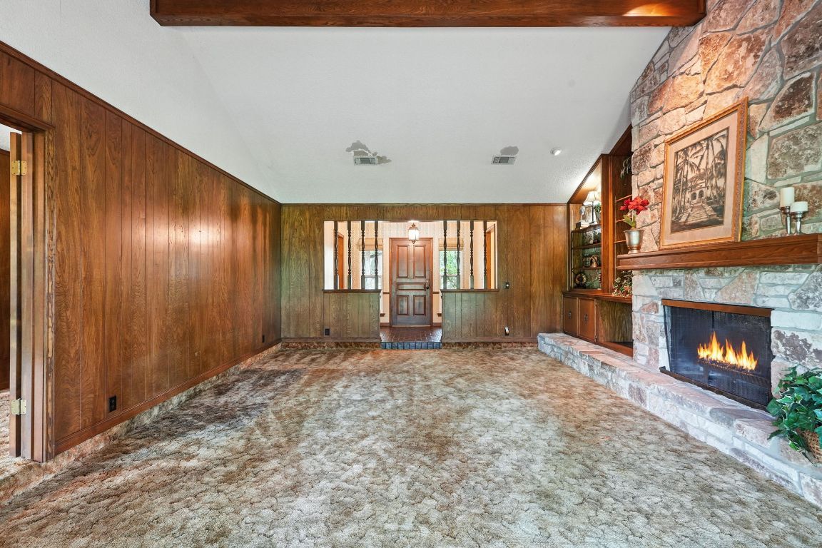 Empty room, Fireplace, Interior, Recessed Lighting, Stone Walls, Wooden Beams, Wooden Walls