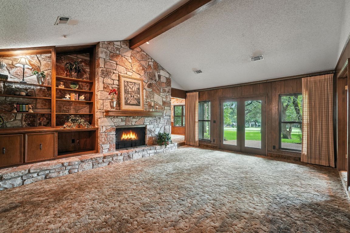 Empty room, Fireplace, Interior, Recessed Lighting, Stone Walls, Wooden Beams