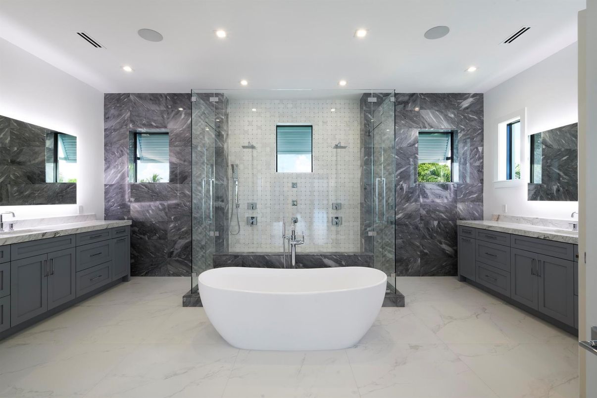 Bathroom, Dual Sink Vanities, Free Standing Baths, Glass Shower, Interior, Marble, Marble Walls, Recessed Lighting