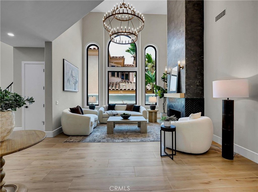 Chandelier, Fireplace, Interior, Living room, Recessed Lighting, Wood Texture Flooring