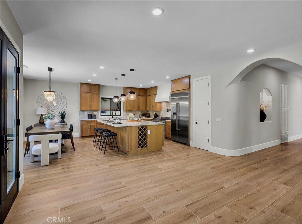 Dining room, Interior, Kitchen, Pendant Lights, Recessed Lighting, Stainless Steel Appliances, Wood Texture Flooring