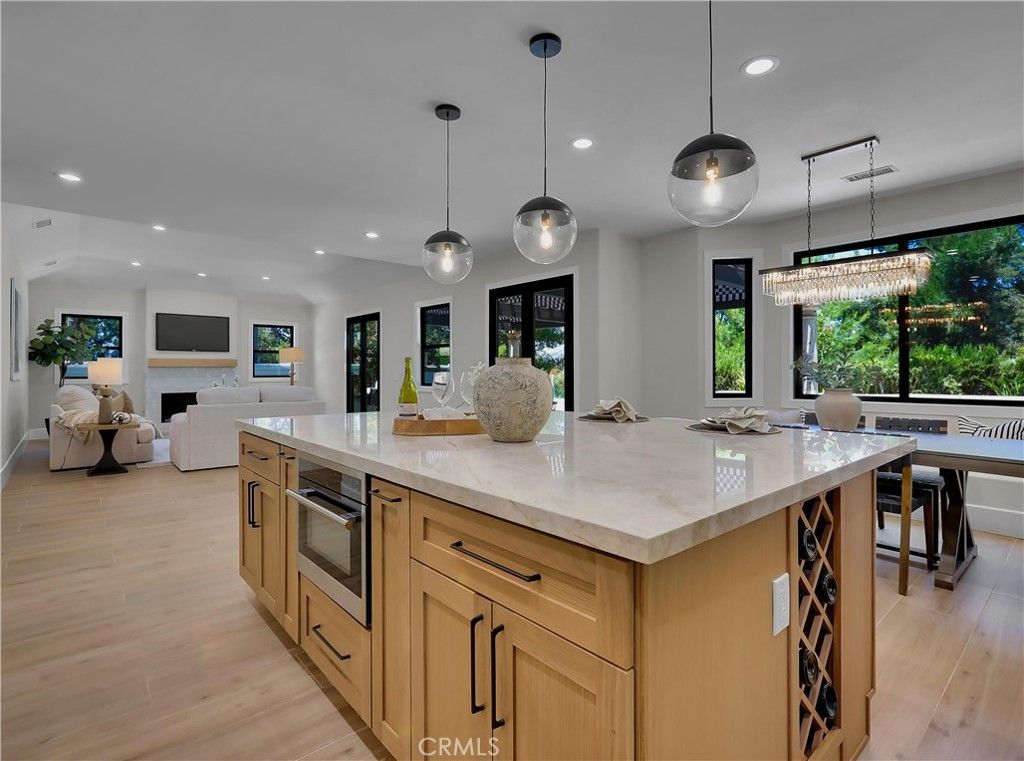Chandelier, Dining room, Interior, Kitchen, Living room, Pendant Lights, Recessed Lighting, Wood Texture Flooring