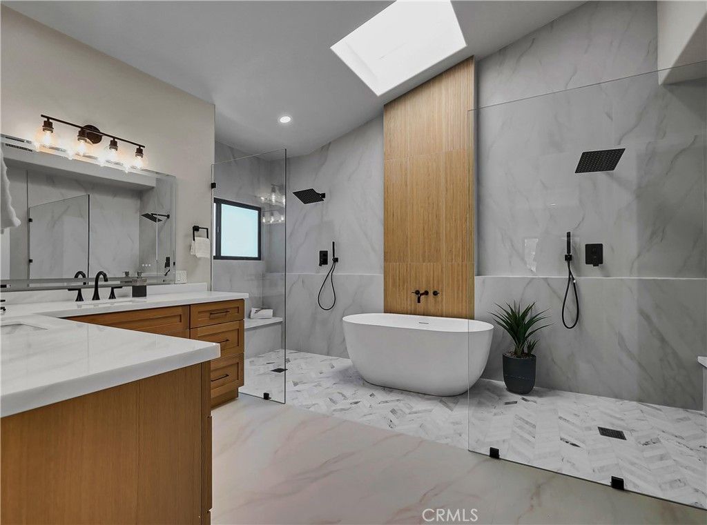 Bathroom, Dual Sink Vanities, Free Standing Baths, Glass Shower, Interior, Marble, Marble Walls, Recessed Lighting