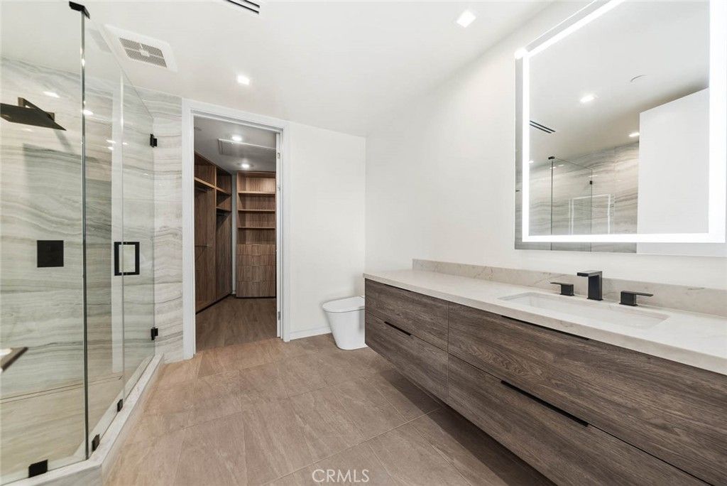 Bathroom, Dual Sink Vanities, Glass Shower, Interior, Recessed Lighting, Walk-in Closets