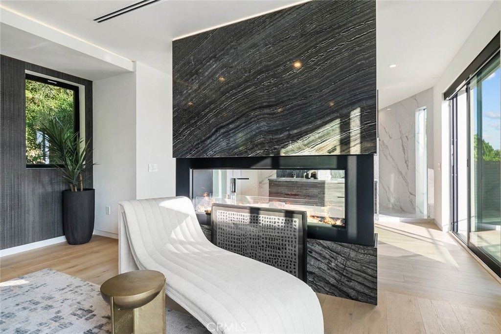 Fireplace, Interior, Marble Walls, Recessed Lighting, Wood Texture Flooring