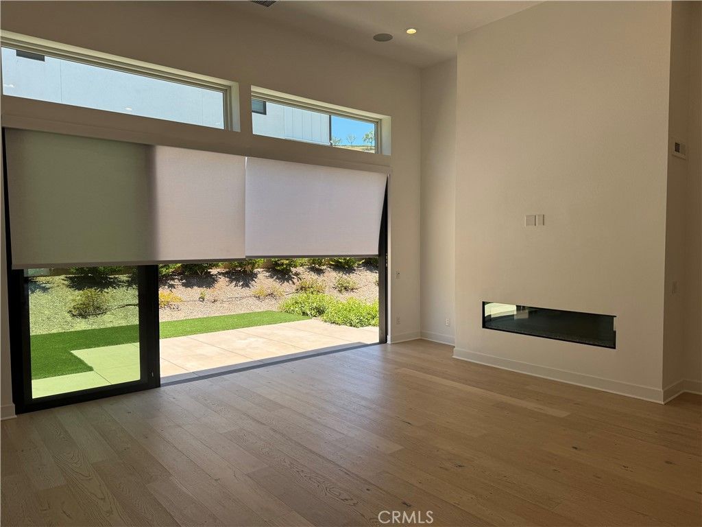 Empty room, Fireplace, Interior, Recessed Lighting, Wood Texture Flooring