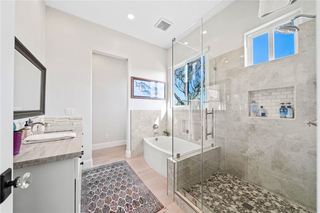 Bathroom, Dual Sink Vanities, Free Standing Baths, Glass Shower, Interior, Recessed Lighting, Wood Texture Flooring
