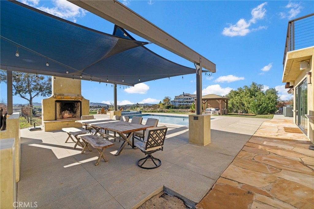 Exterior, Fireplace, Pool
