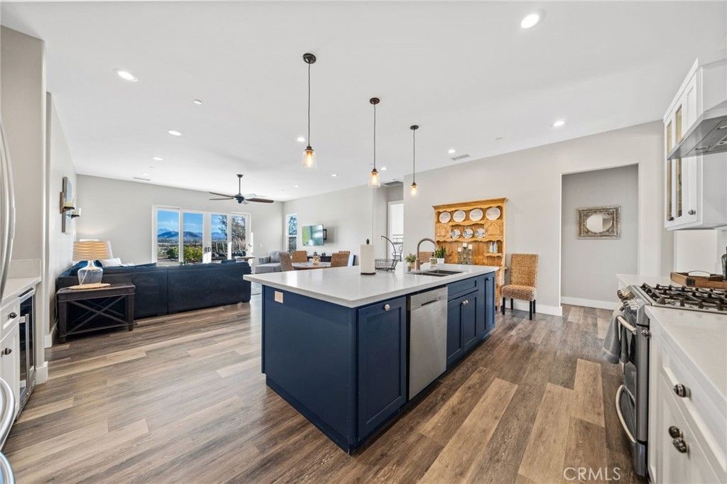 Dining room, Interior, Kitchen, Living room, Pendant Lights, Recessed Lighting, Stainless Steel Appliances, Wood Texture Flooring