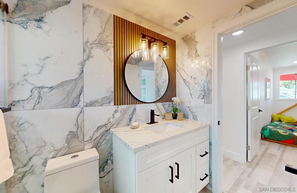 Bathroom, Dual Sink Vanities, Interior, Marble Walls, Recessed Lighting