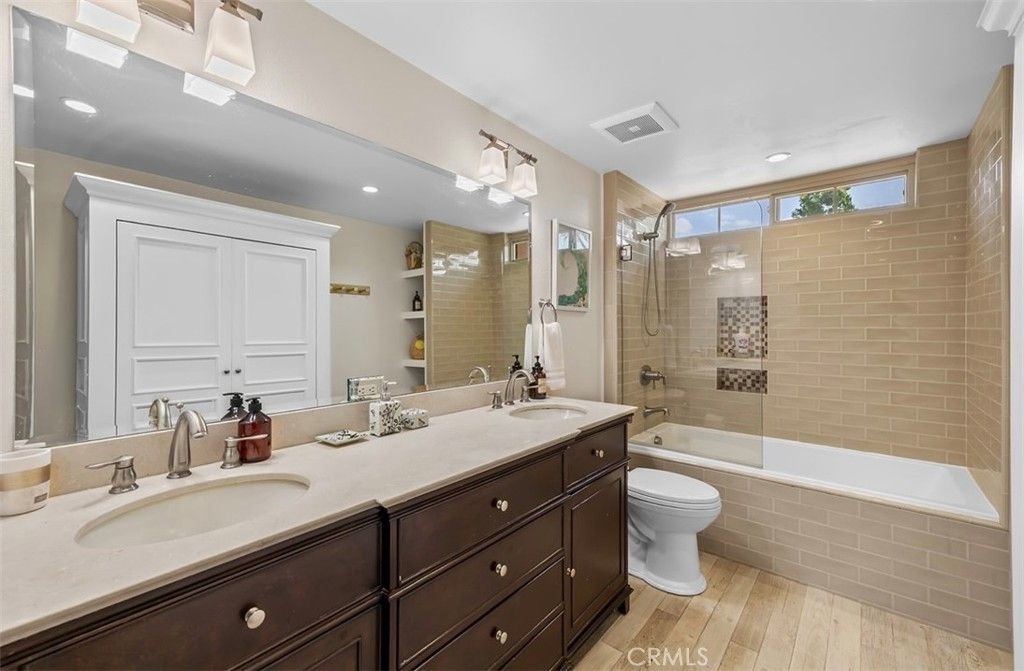 Bathroom, Dual Sink Vanities, Glass Shower, Interior, Recessed Lighting, Wood Texture Flooring