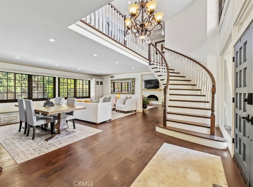 Chandelier, Dining room, Fireplace, Interior, Living room, Recessed Lighting, Wood Texture Flooring