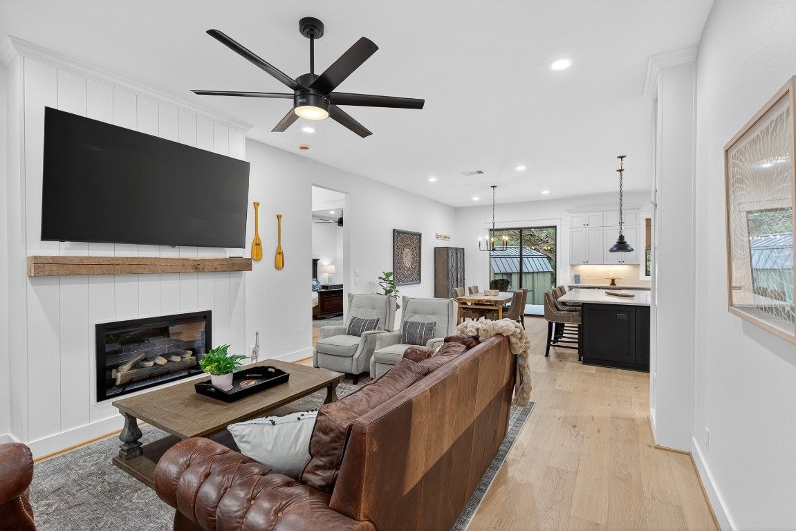 Dining room, Fireplace, Interior, Kitchen, Living room, Pendant Lights, Recessed Lighting, Wood Texture Flooring