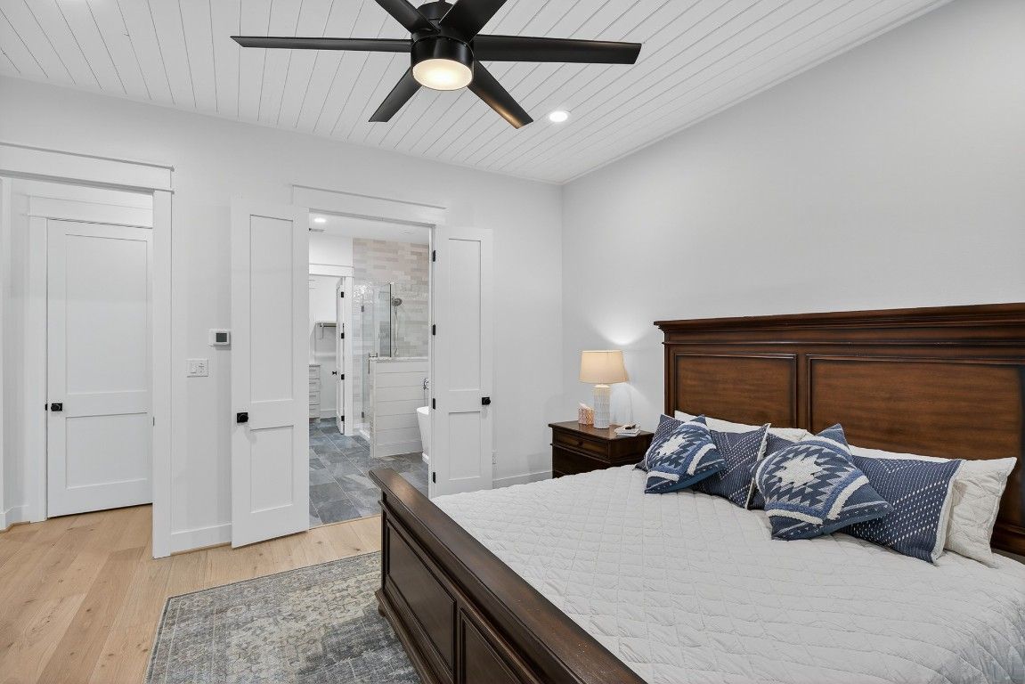 Bathroom, Bedroom, Glass Shower, Interior, Recessed Lighting, Wood Texture Flooring