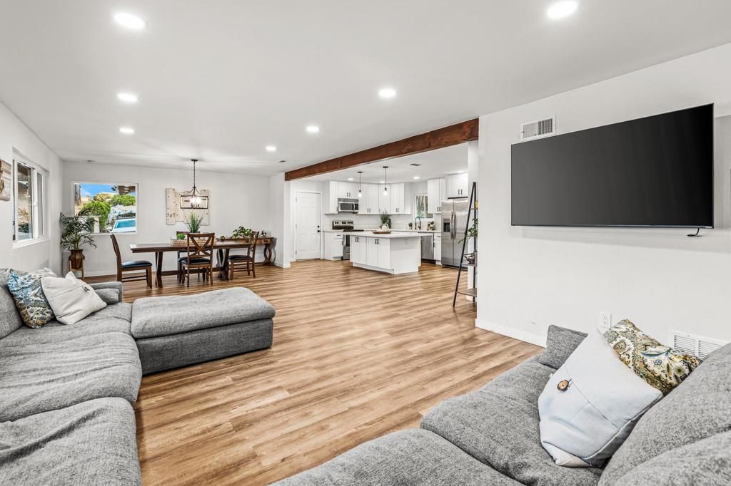 Dining room, Interior, Kitchen, Living room, Pendant Lights, Recessed Lighting, Stainless Steel Appliances, Wood Texture Flooring