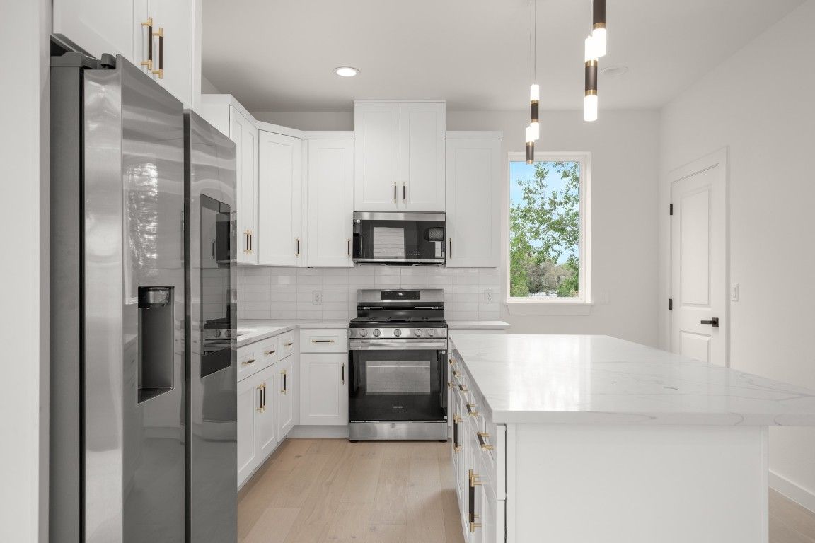 Interior, Kitchen, Pendant Lights, Recessed Lighting, Stainless Steel Appliances, Wood Texture Flooring