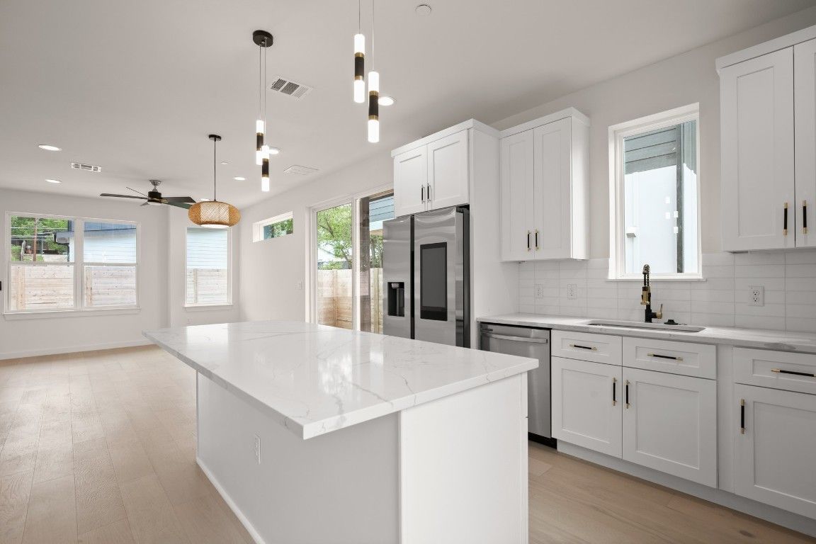 Interior, Kitchen, Pendant Lights, Recessed Lighting, Stainless Steel Appliances, Wood Texture Flooring