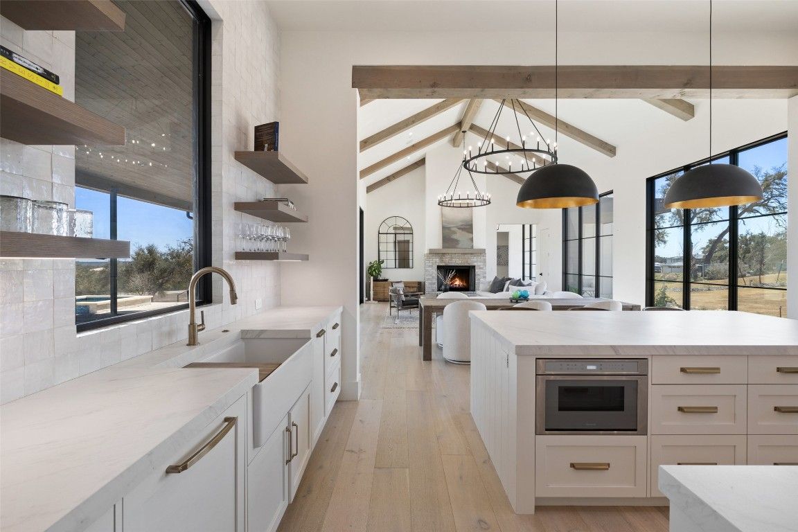 Fireplace, Interior, Kitchen, Living room, Pendant Lights, Stainless Steel Appliances, Wooden Beams, Wood Texture Flooring