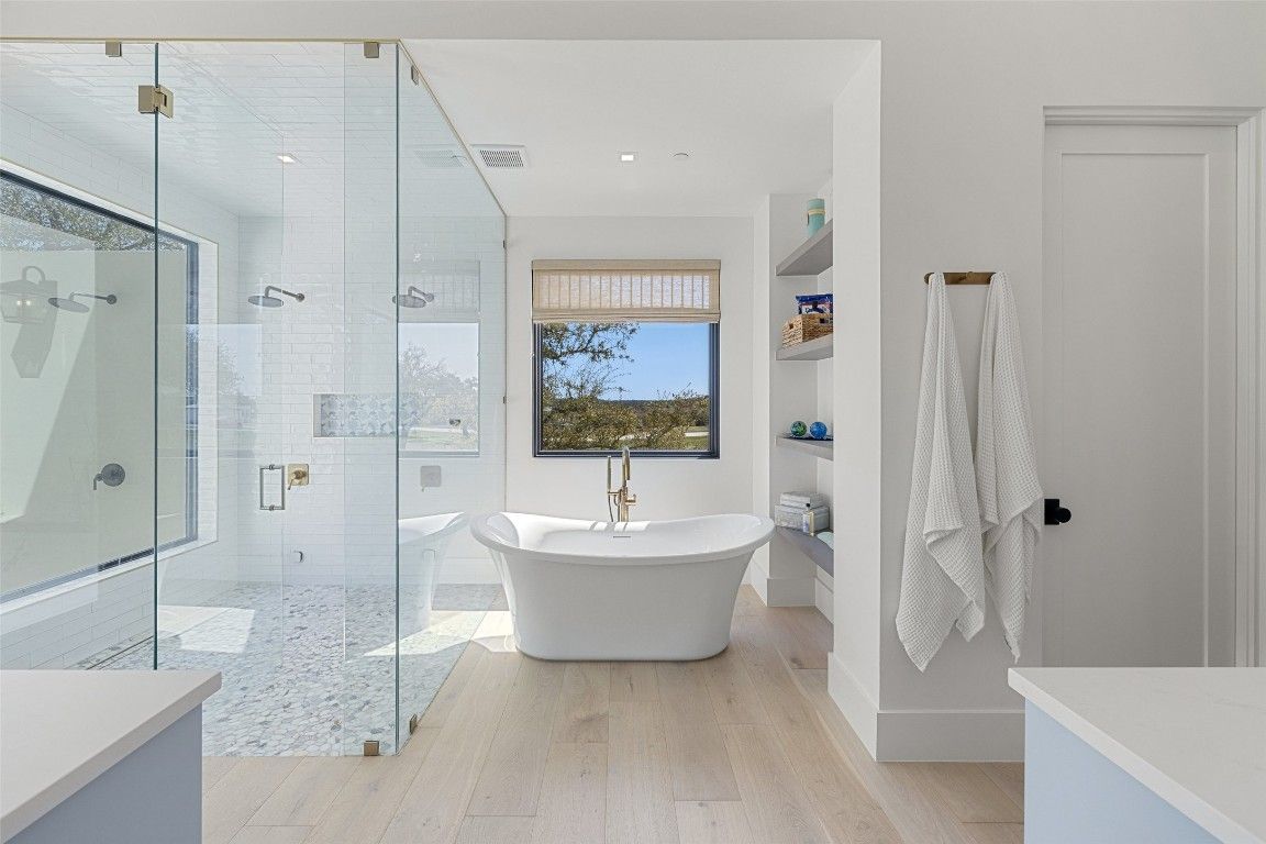 Bathroom, Free Standing Baths, Glass Shower, Interior, Recessed Lighting, Wood Texture Flooring