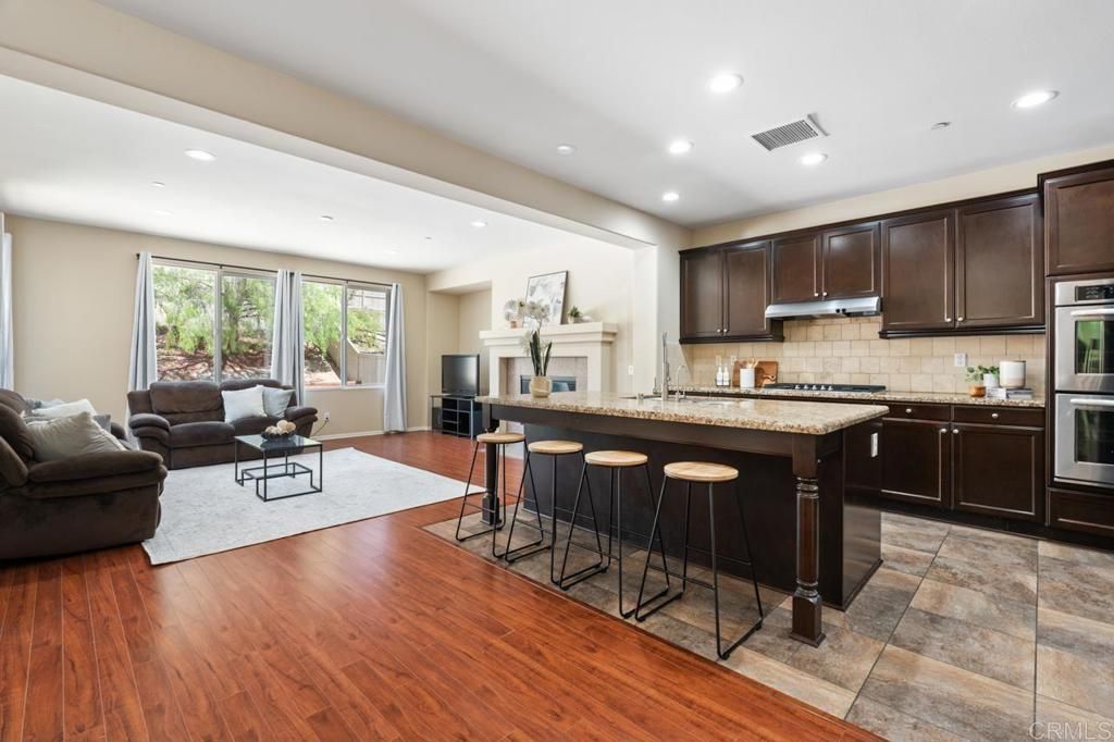Fireplace, Interior, Kitchen, Living room, Recessed Lighting, Wood Texture Flooring