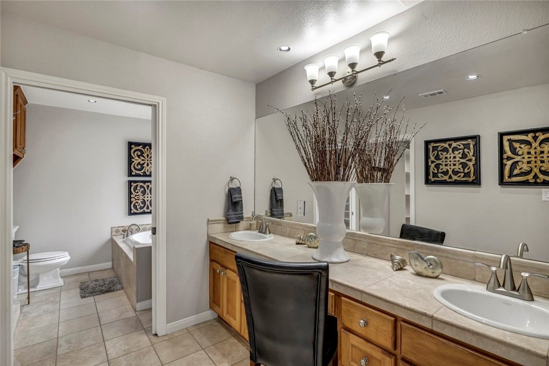 Bathroom, Dual Sink Vanities, Interior, Recessed Lighting, Tile Countertops
