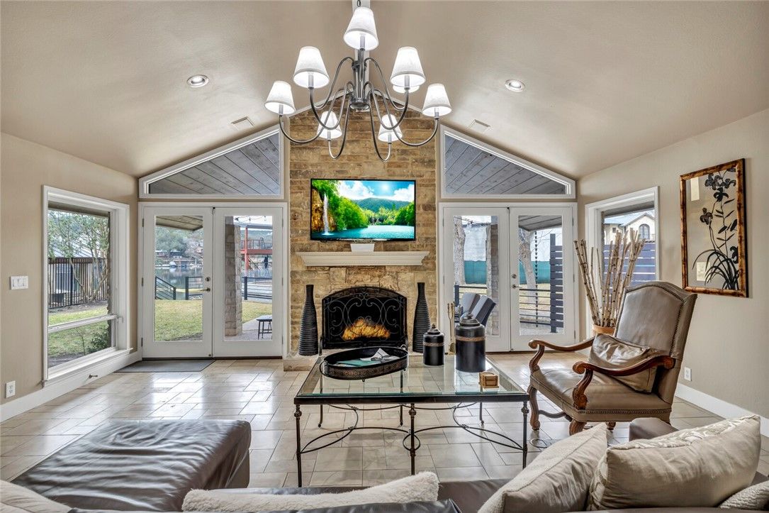 Chandelier, Fireplace, Interior, Living room, Recessed Lighting, Stone Walls
