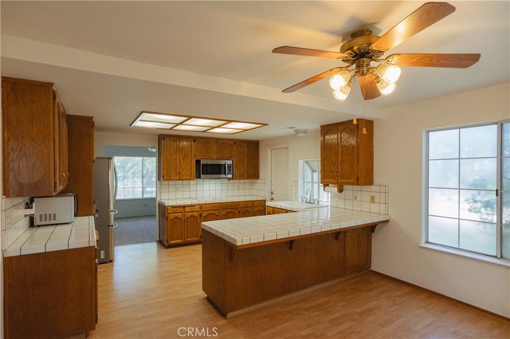 Interior, Kitchen, Tile Countertops, Wood Texture Flooring
