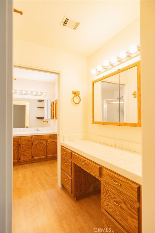 Bathroom, Dual Sink Vanities, Interior, Tile Countertops, Wood Texture Flooring
