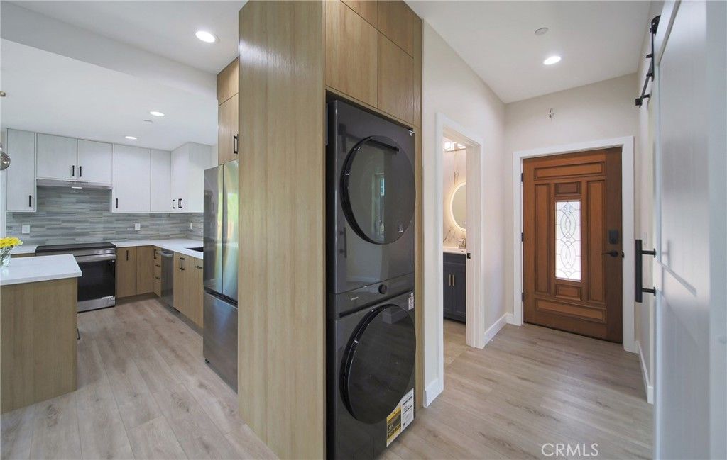 Interior, Kitchen, Recessed Lighting, Washer, Wood Texture Flooring