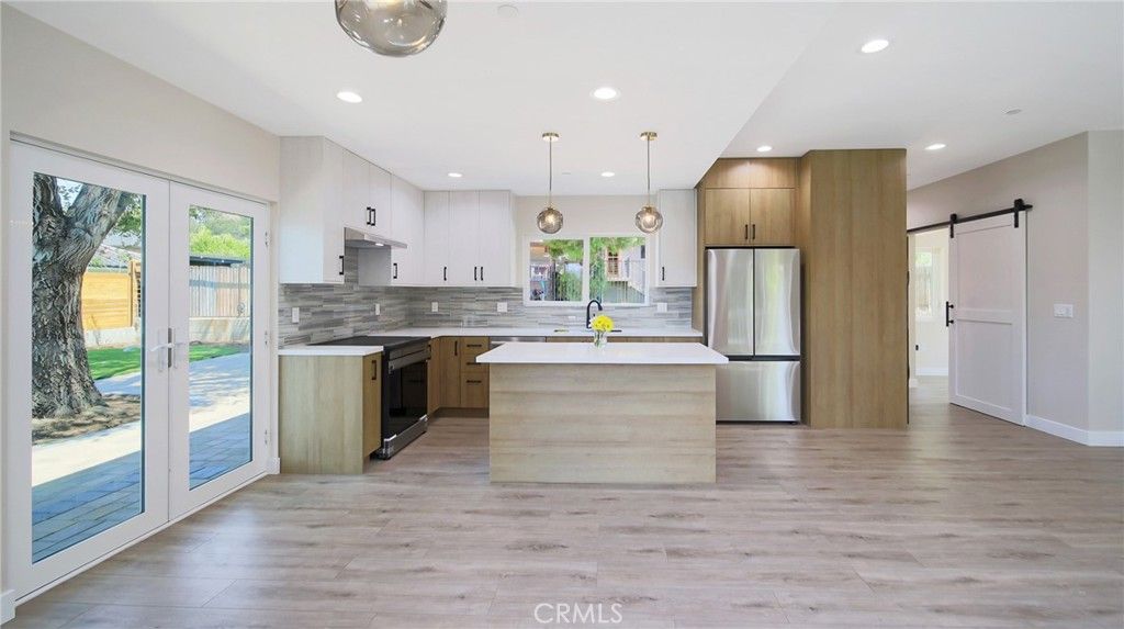 Interior, Kitchen, Pendant Lights, Recessed Lighting, Stainless Steel Appliances, Wood Texture Flooring