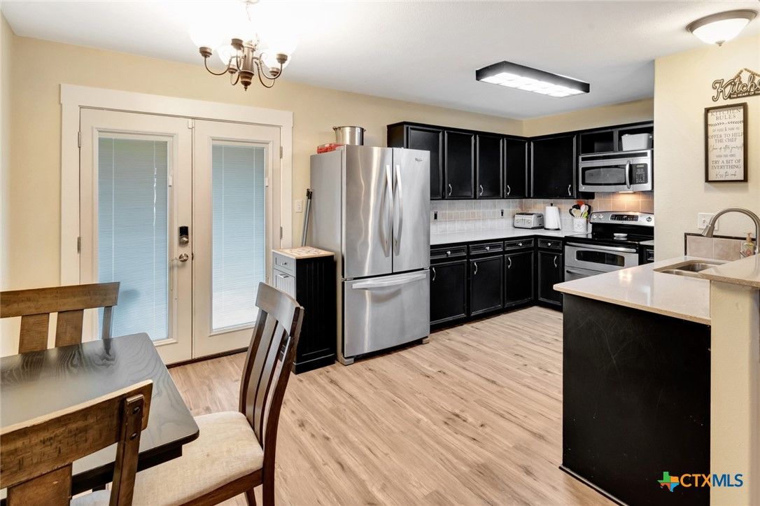Chandelier, Interior, Kitchen, Stainless Steel Appliances, Wood Texture Flooring