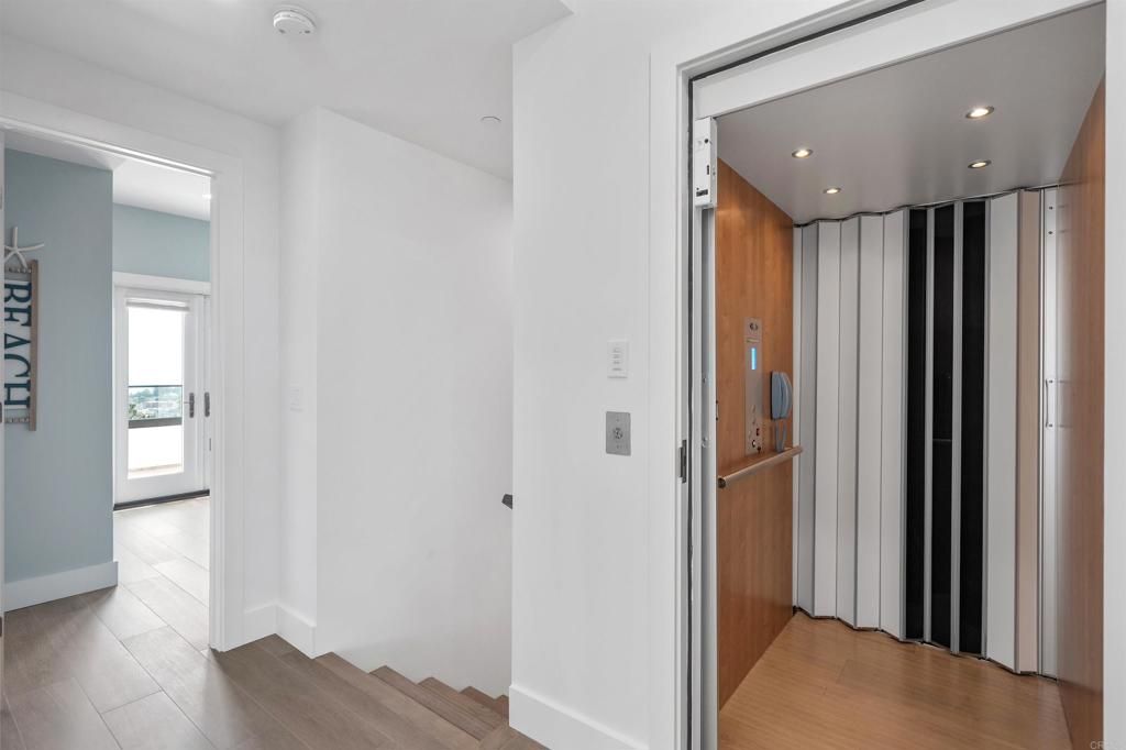 Elevator, Interior, Recessed Lighting, Wood Texture Flooring